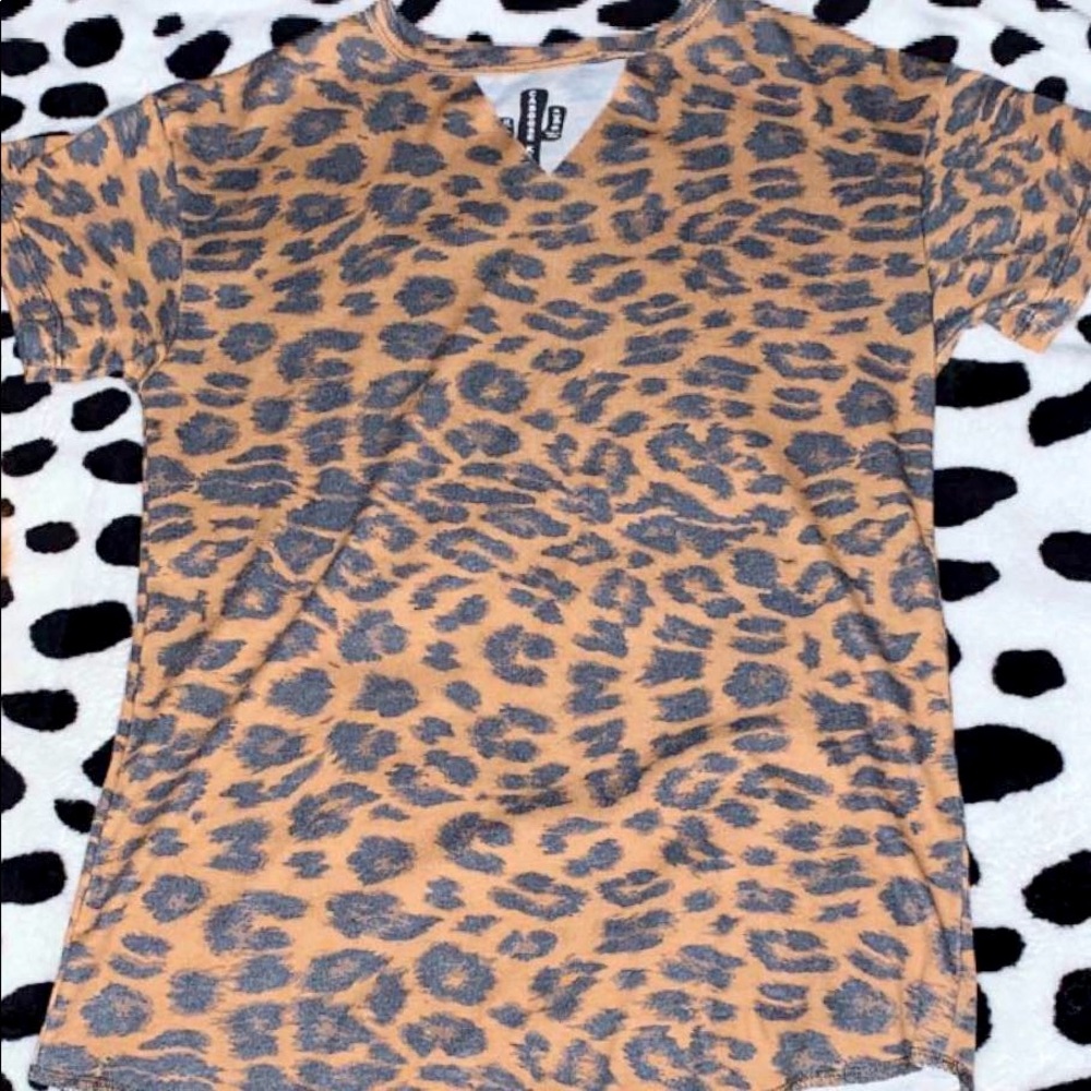 This is a leopard shirt v cut